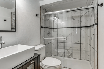 Fusion fort worth updated bathroom with walk-in shower